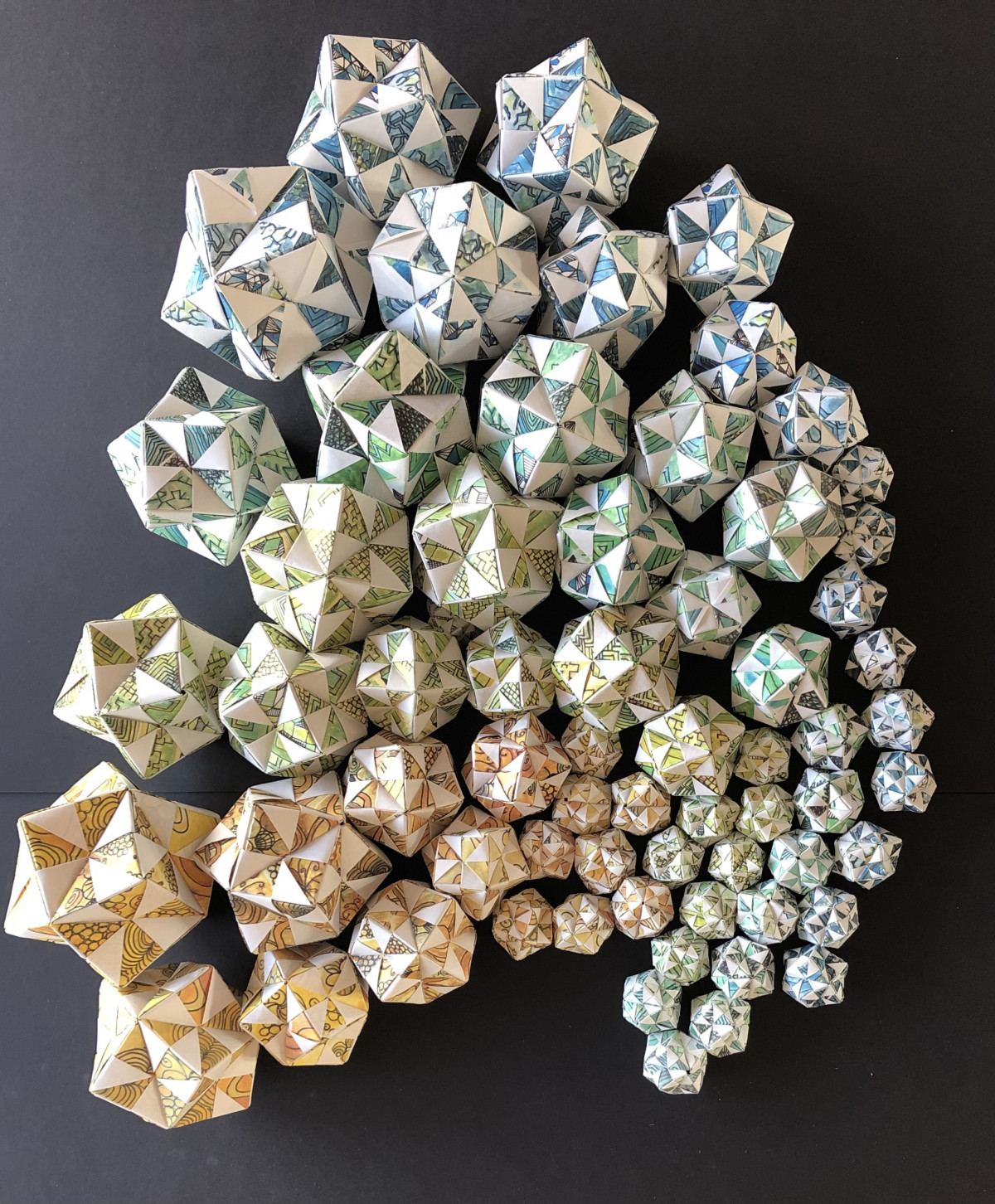 Origami polygons resembling naturally occurring fractals