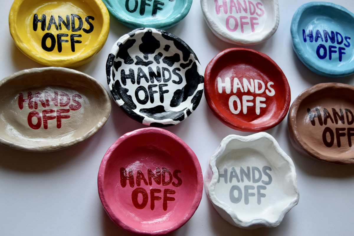 'Hands Off';  Clay pots, front